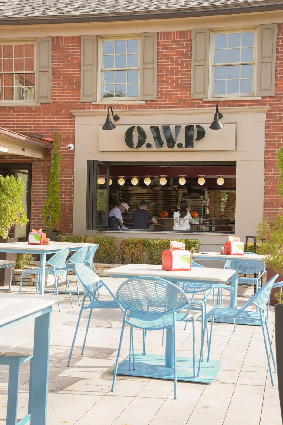 The O.W.P storefront and patio on Old Woodward